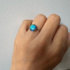 Handcrafted artisan sterling and lab opal ring
